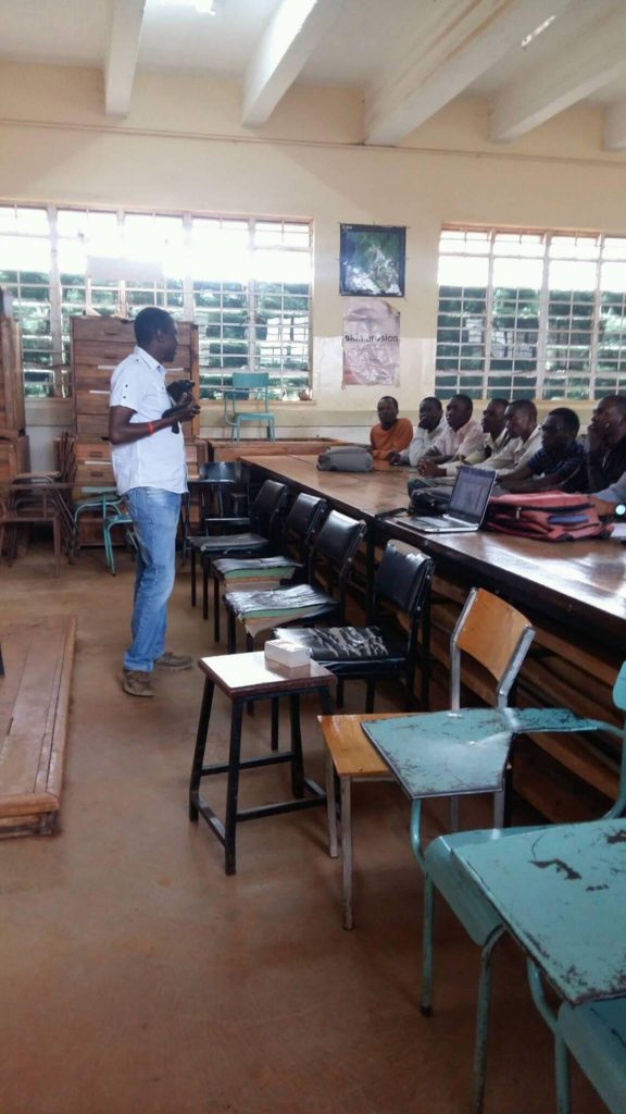 Josh Ogure talking to the students