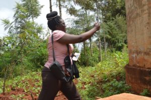 Ruth, one of the trainees, taking a photo of a point.