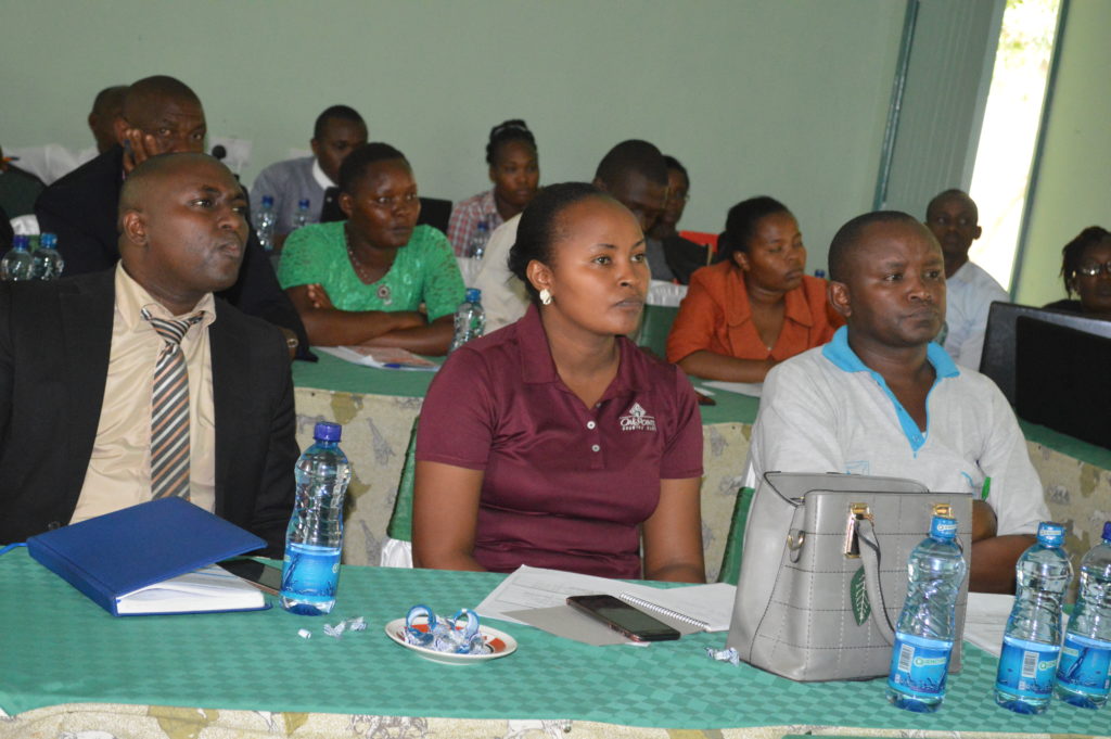 Mr. Eliud Ngila Munya Chief Officer, Planning. Makueni County on the front left following the training keenly