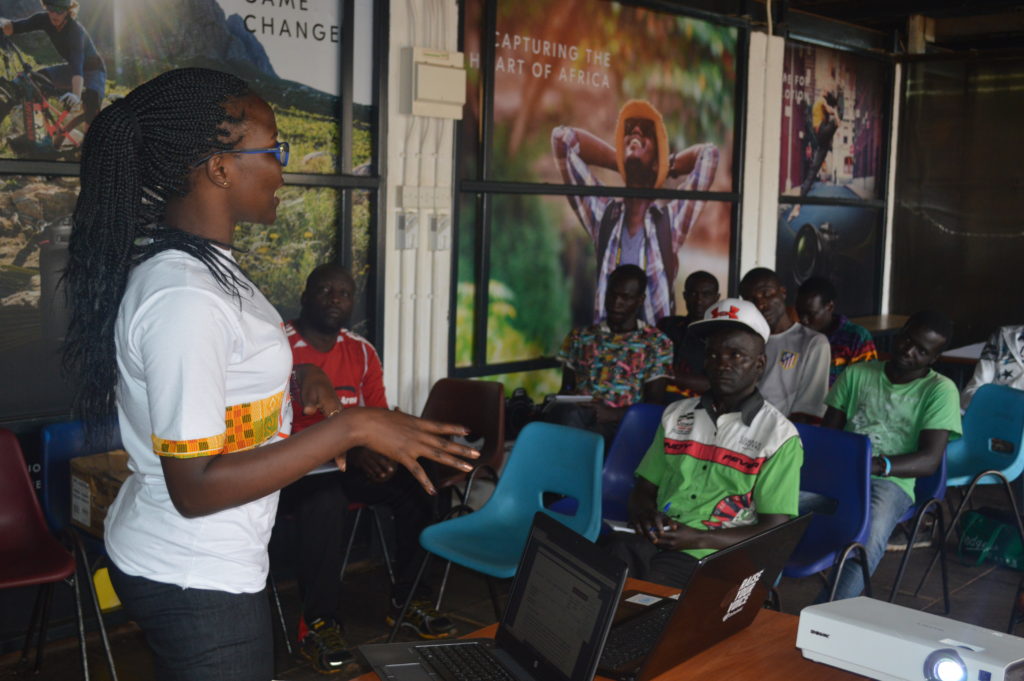 Sharon presenting about OSM Kenya.