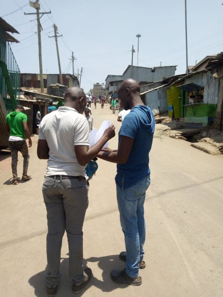 Our team members from Mathare while on the field to cross-check and verify the data that was imported and checking for any extra information that was not captured.