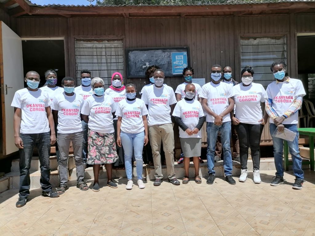 A group photo with representatives of different organizations in Kibera.